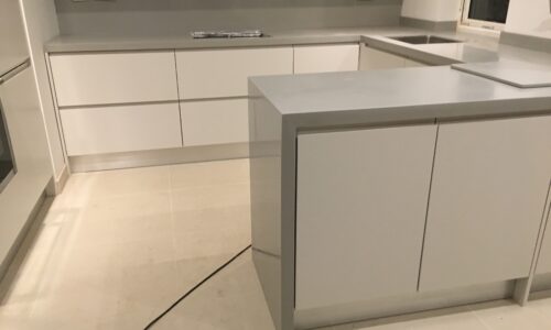 Warm Grey Kitchen with Waterfall Peninsula